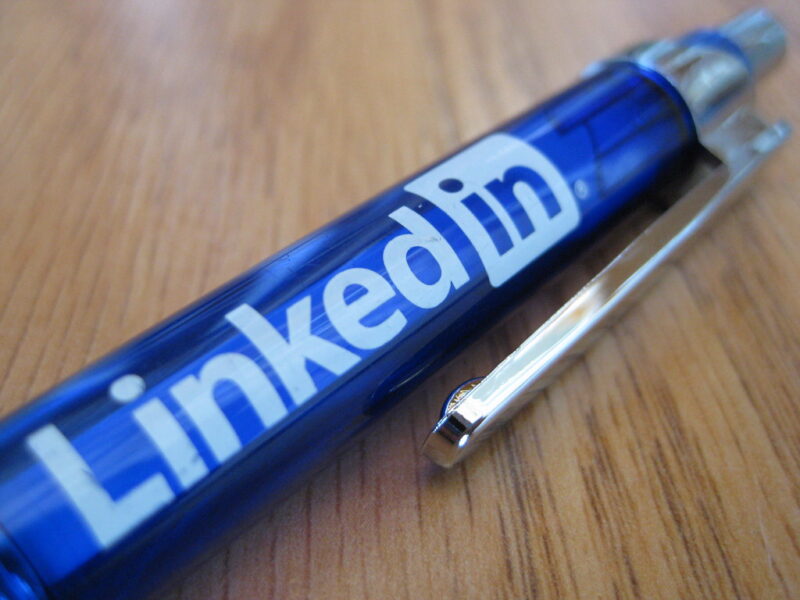 writing pen with LinkedIn logo